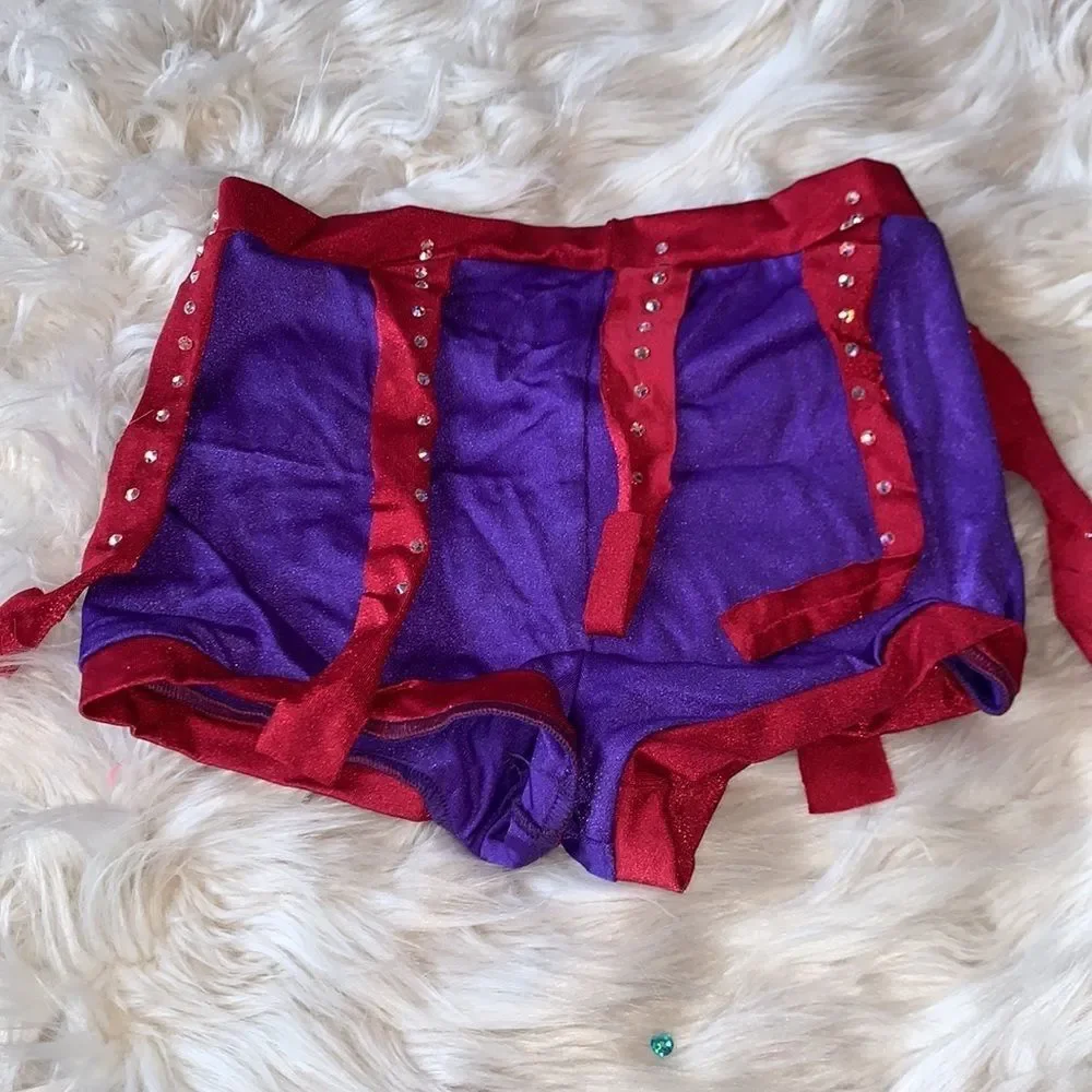 Custom dance costume with Swarovski crystals. Orange, Red and Purple Two Piece
